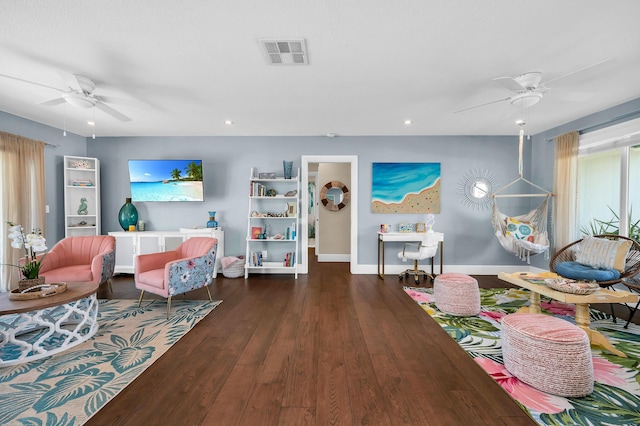living area with recessed lighting, a healthy amount of sunlight, and a ceiling fan