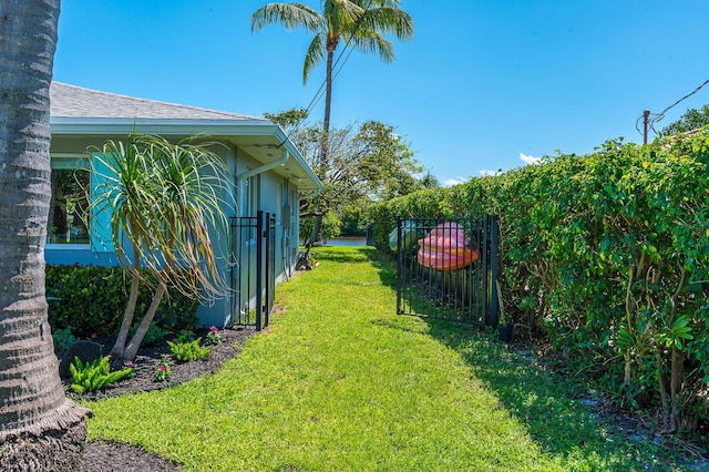 view of yard featuring fence
