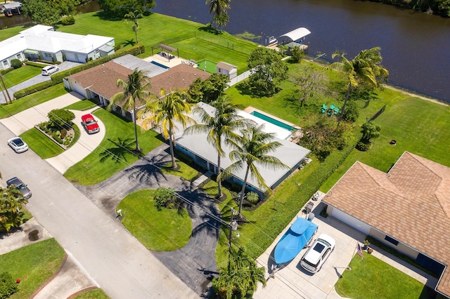 birds eye view of property featuring a water view
