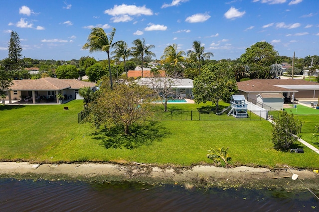 birds eye view of property with a water view