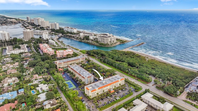 aerial view featuring a water view and a city view