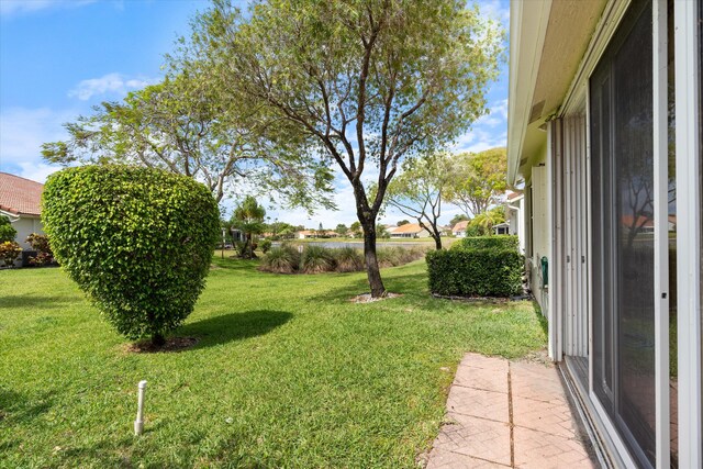 view of yard with a water view
