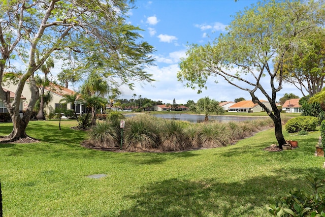 6092 Caladium Rd, Delray Beach, FL 33484 - view of grassy yard featuring a water view