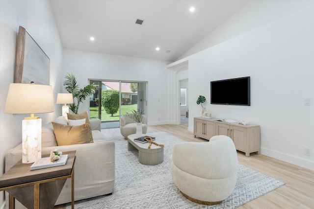 living area with recessed lighting, baseboards, visible vents, and light wood-type flooring