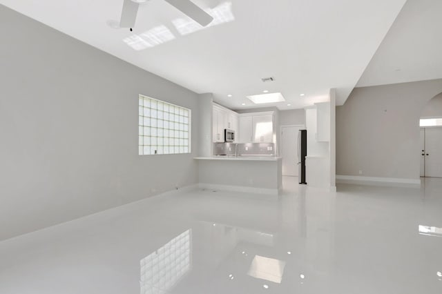 unfurnished living room with recessed lighting, a ceiling fan, baseboards, and visible vents