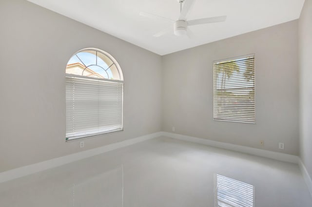 spare room featuring a ceiling fan