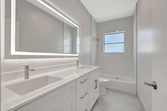 full bathroom with a sink, toilet, double vanity, and tub / shower combination