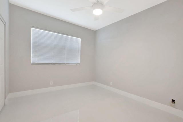 unfurnished room with ceiling fan