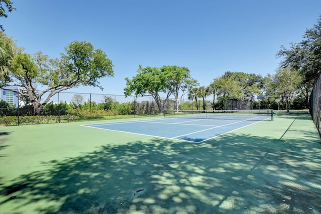 view of sport court featuring fence and community basketball court