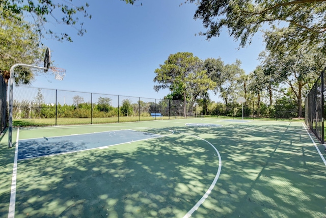 view of sport court with community basketball court and fence