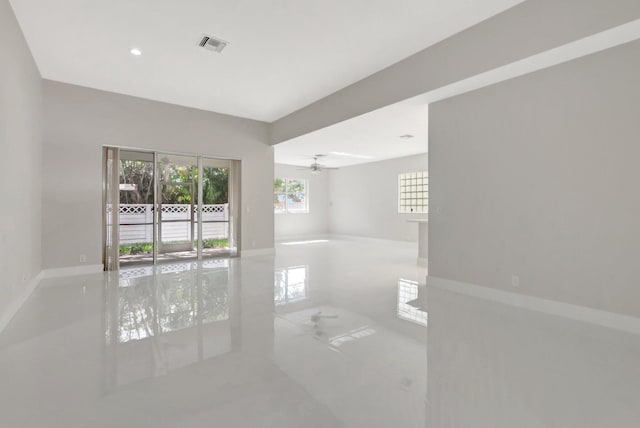 spare room with recessed lighting, baseboards, visible vents, and ceiling fan