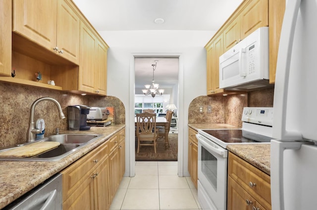 kitchen featuring an inviting chandelier, white appliances, open shelves, light tile patterned flooring, and a sink