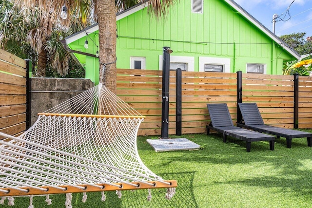 view of yard featuring fence
