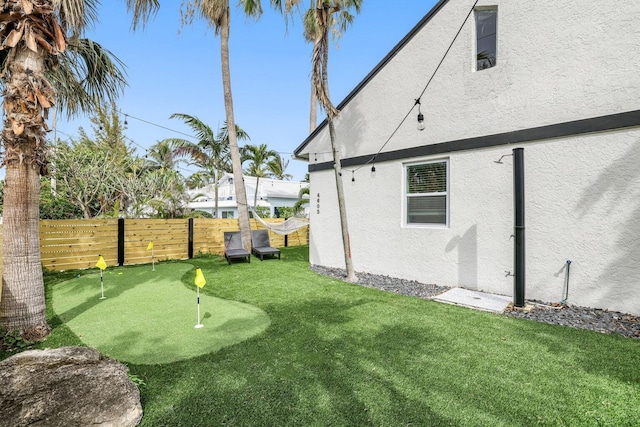 view of yard featuring fence
