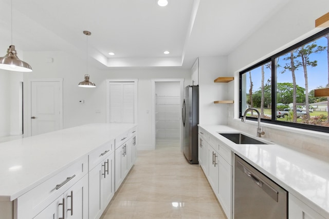 6002 Myrtle Dr, Fort Pierce, FL 34982 - kitchen with stainless steel appliances, a sink, light countertops, and recessed lighting