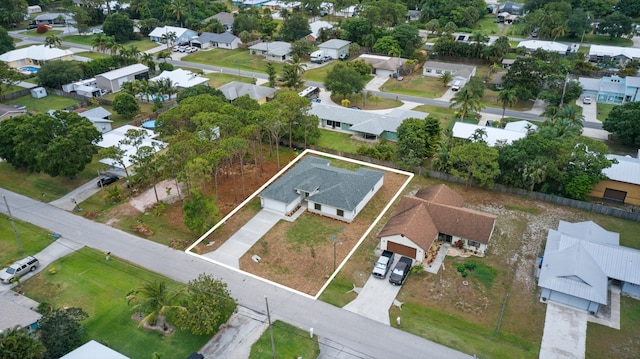 6002 Myrtle Dr, Fort Pierce, FL 34982 - aerial overview of property's location featuring property parcel outlined and nearby suburban area