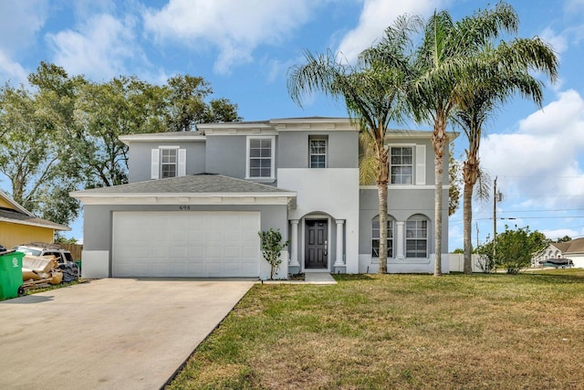698 SW Mchole Ave, Port Saint Lucie, FL 34953 - traditional-style home with an attached garage, driveway, a front yard, and stucco siding