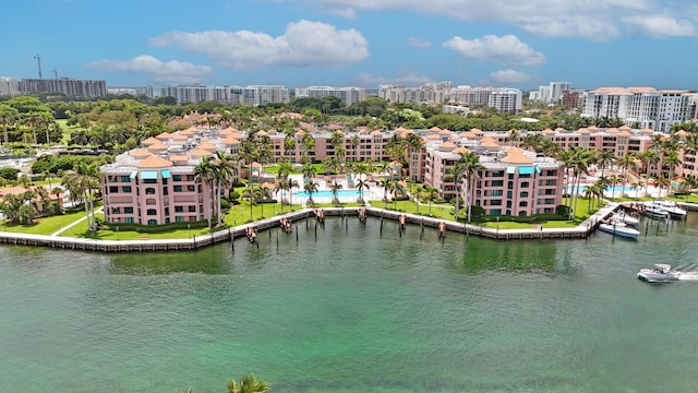 bird's eye view with a water view and a view of city