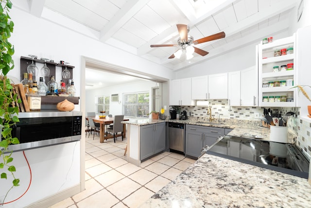 2869 SW 13th Ct, Fort Lauderdale, FL 33312 - kitchen with stainless steel appliances, a sink, tasteful backsplash, a ceiling fan, and gray cabinets