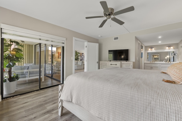 bedroom featuring access to outside, ceiling fan, connected bathroom, visible vents, and light wood finished floors