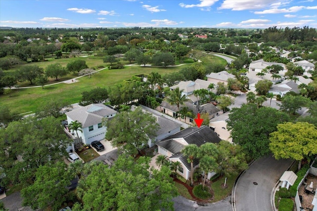birds eye view of property with a residential view
