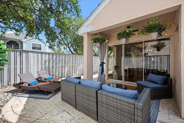 view of patio with a fenced backyard and an outdoor hangout area