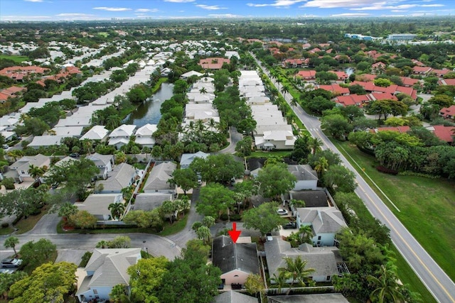 birds eye view of property with a residential view