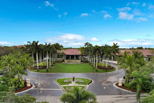 surrounding community featuring a lawn