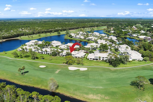 5657 SE Foxcross Pl, Stuart, FL 34997 - aerial view of property and surrounding area with a golf club, nearby suburban area, and a large body of water