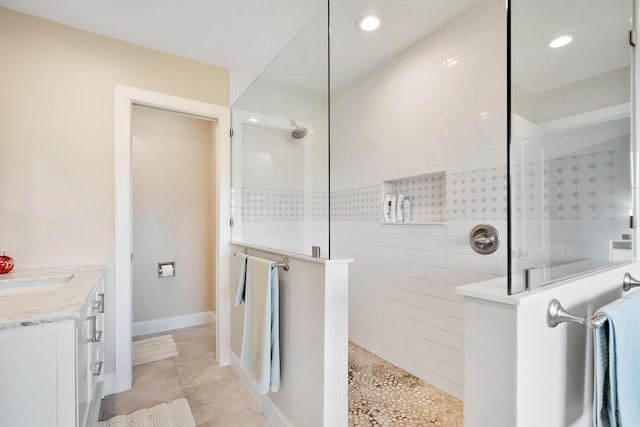 5657 SE Foxcross Pl, Stuart, FL 34997 - bathroom featuring a walk in shower, recessed lighting, and vanity