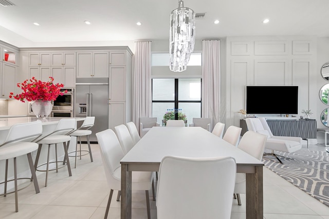 dining space featuring visible vents, recessed lighting, a notable chandelier, and light tile patterned flooring