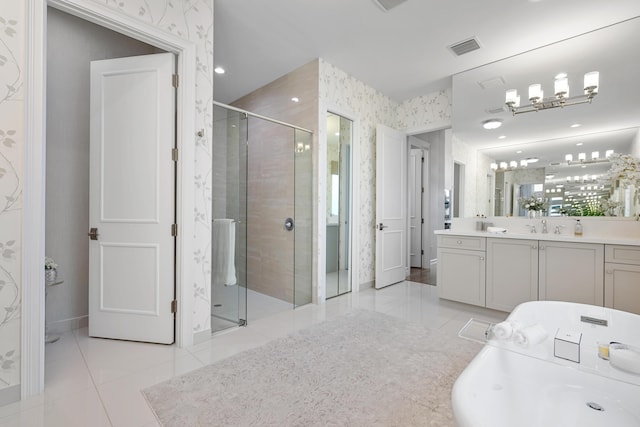 full bath featuring vanity, tile patterned flooring, visible vents, a stall shower, and wallpapered walls