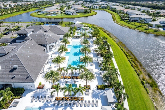 aerial view featuring a water view and a residential view