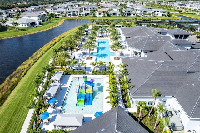 aerial view featuring a water view and a residential view