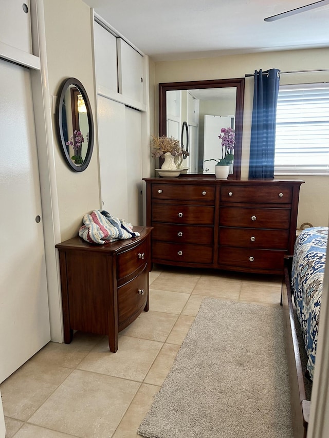 1505 Kingsley Rd, Jupiter, FL 33469 - bedroom featuring light tile patterned flooring and multiple closets