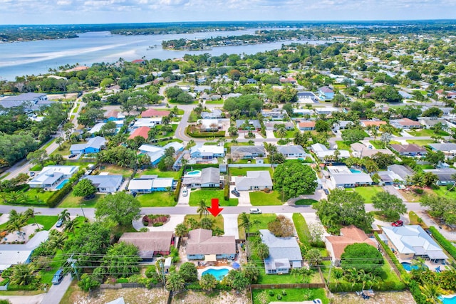 1505 Kingsley Rd, Jupiter, FL 33469 - aerial view of property's location featuring a nearby body of water, nearby suburban area, and a pool area