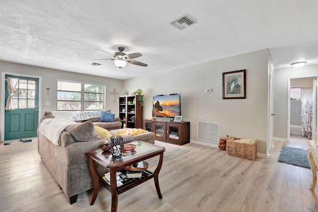 1505 Kingsley Rd, Jupiter, FL 33469 - living area featuring light wood-style floors, ceiling fan, and baseboards