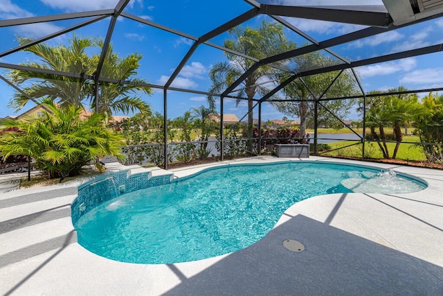 outdoor pool with a patio area and glass enclosure