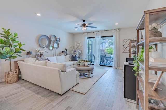 348 SE Courances Dr, Port Saint Lucie, FL 34984 - living room featuring light wood-style flooring, ceiling fan, and recessed lighting