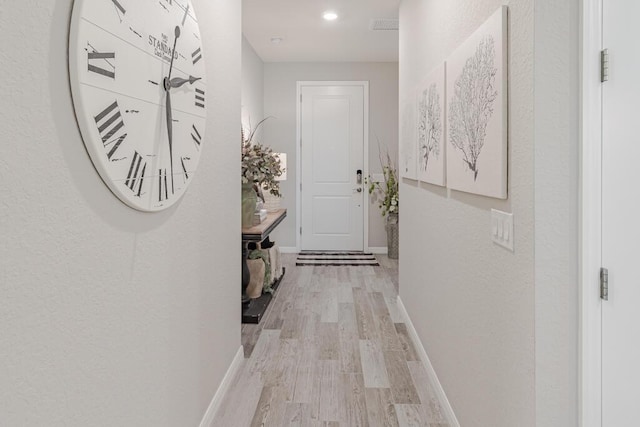 348 SE Courances Dr, Port Saint Lucie, FL 34984 - hall featuring light wood-style floors and recessed lighting