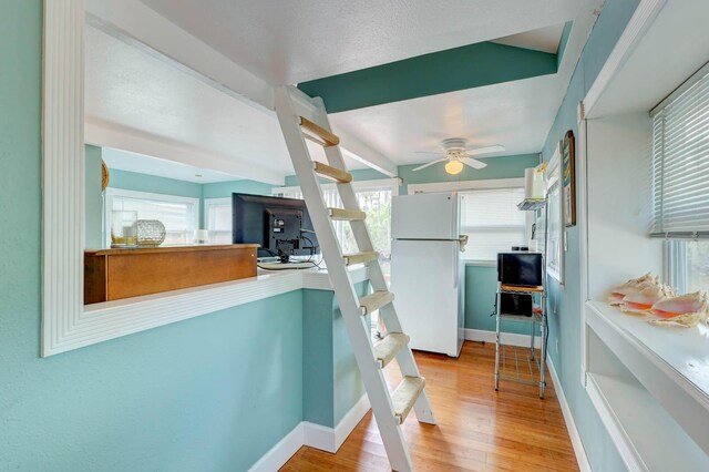 108 NE Carlisle Ln, Port Saint Lucie, FL 34952 - interior space with wood finished floors, baseboards, and beam ceiling