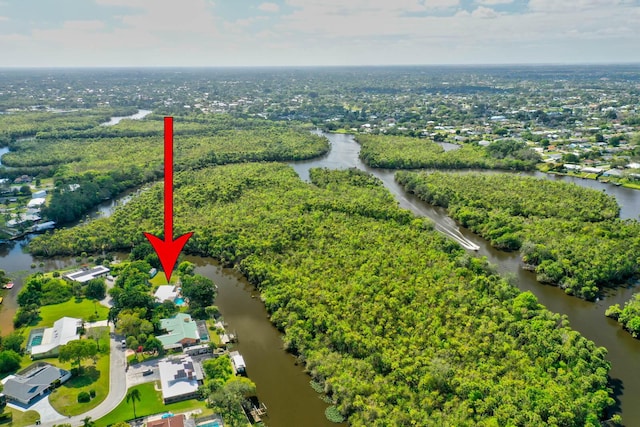108 NE Carlisle Ln, Port Saint Lucie, FL 34952 - birds eye view of property with a water view