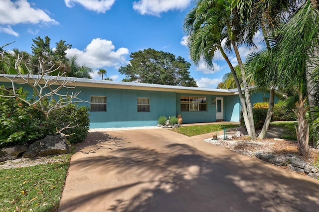 108 NE Carlisle Ln, Port Saint Lucie, FL 34952 - ranch-style house with concrete block siding