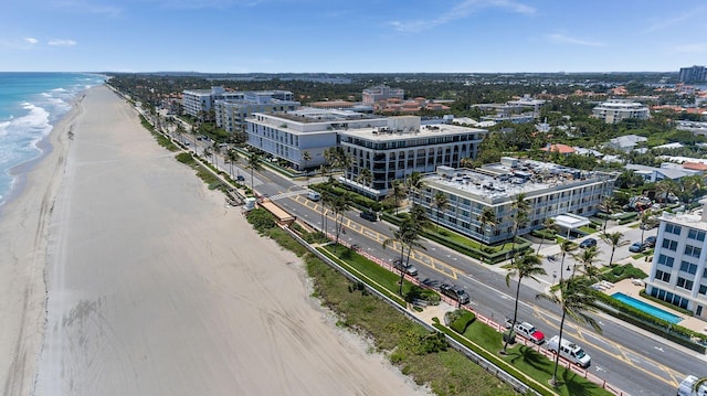 bird's eye view with a view of the beach, a view of city, and a water view