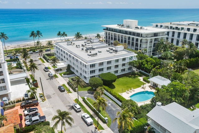 aerial view with a beach view and a water view