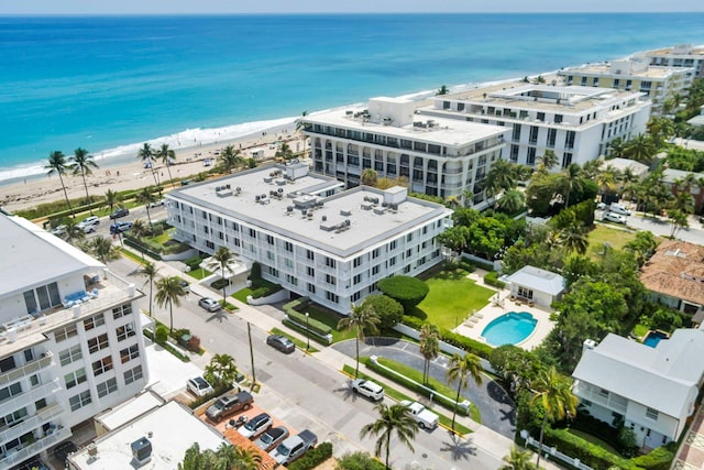 drone / aerial view with a view of the beach and a water view