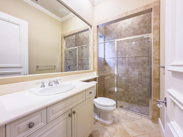 full bathroom with vanity, tile patterned floors, crown molding, toilet, and a shower stall