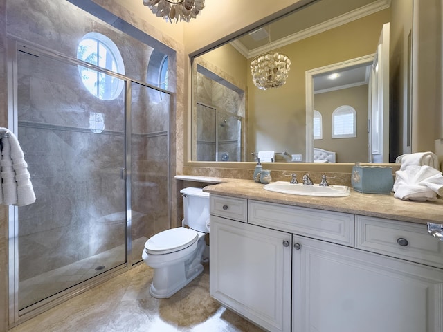 bathroom featuring ornamental molding, toilet, a chandelier, a shower stall, and vanity