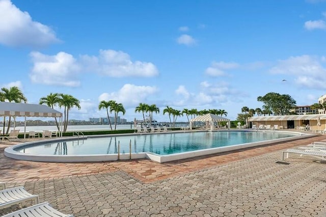 community pool with a patio
