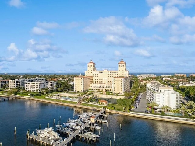 aerial view with a view of city and a water view